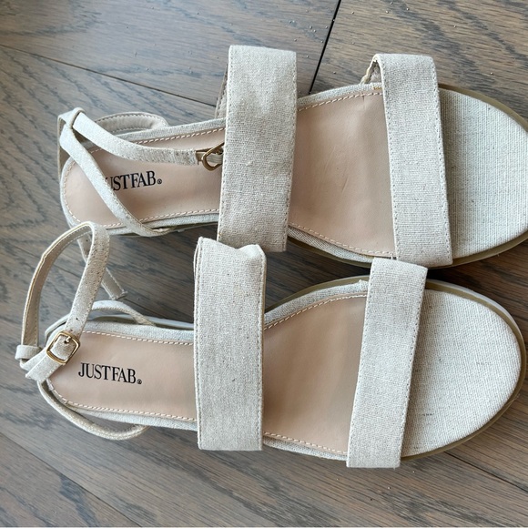 Beige strappy sandals with a slight lift. Beautiful faux snakeskin accents! - Picture 3 of 3